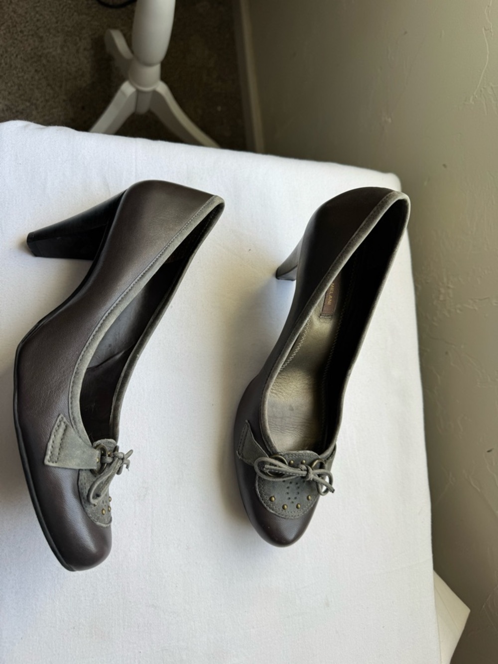 Antonio Melani brown leather slip-on heel pumps featuring studs on the toe. 9
